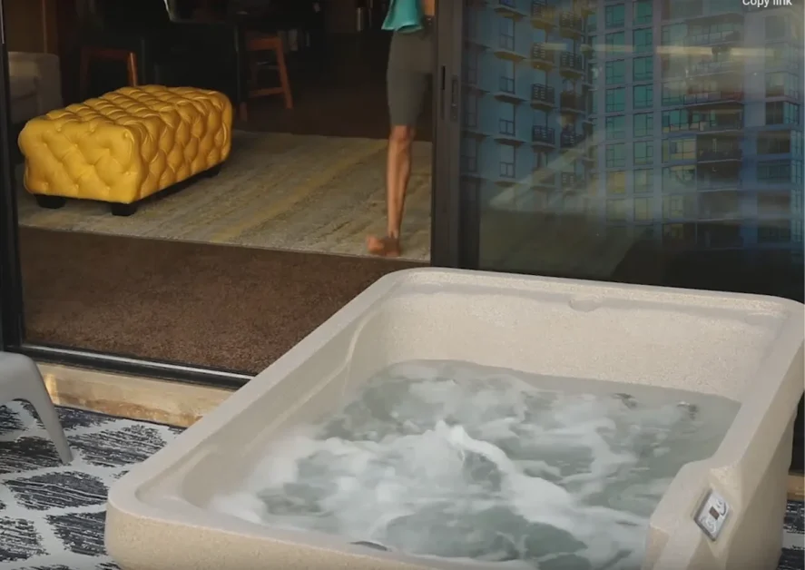 120v Hot Tub 2-Person: Affordable, Space-Saving, Relaxation<gwmw style="display:none;"></gwmw> 6 A Freeflow Spas Mini in a home open area ready to use.