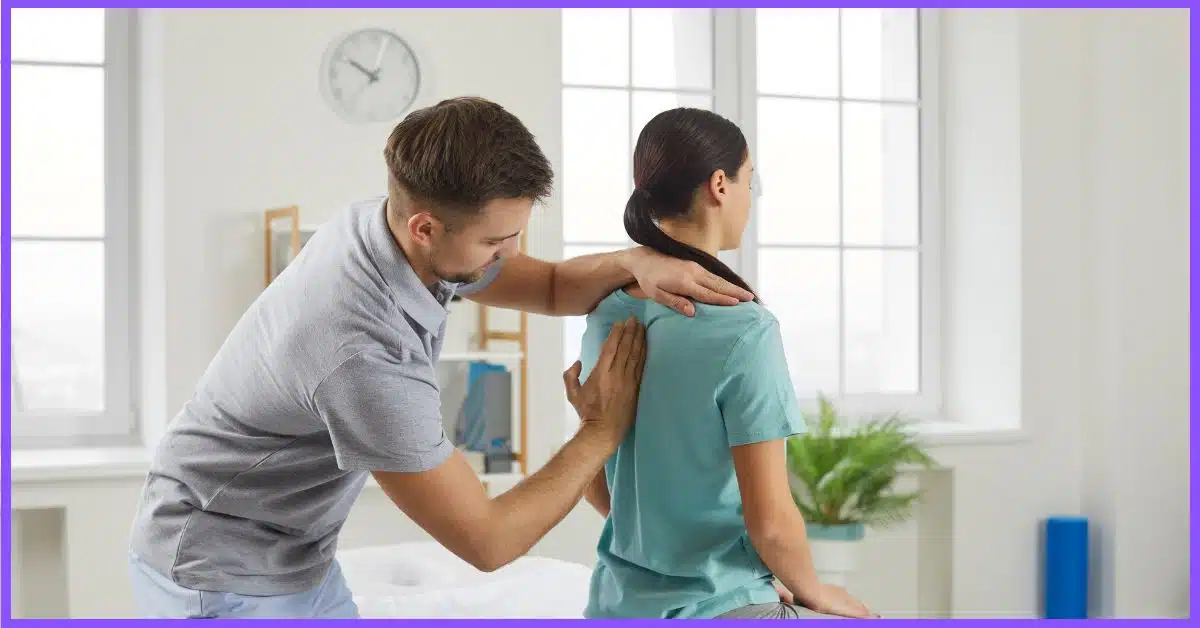  A male therapist providing injury therapy to a female patient. (How Many Types of Injuries Therapists)