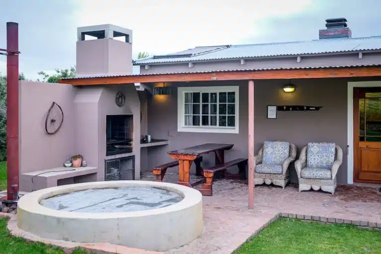 In-Ground concrete Spa in an open house garden