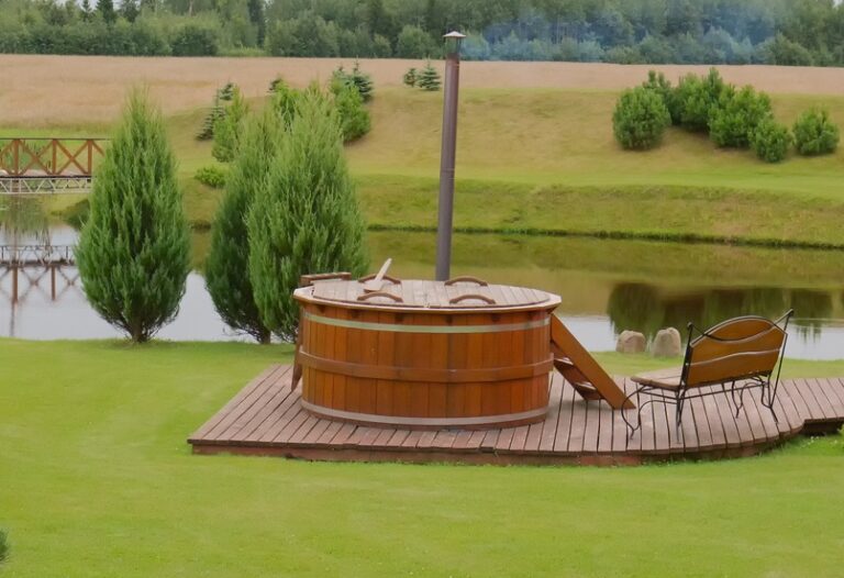 Cheddar hot tub positioned on a wooden base pad in an outdoor home garden