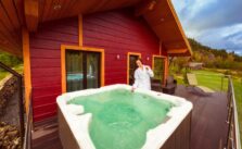 A woman with white robe ready to use a Hot Tub