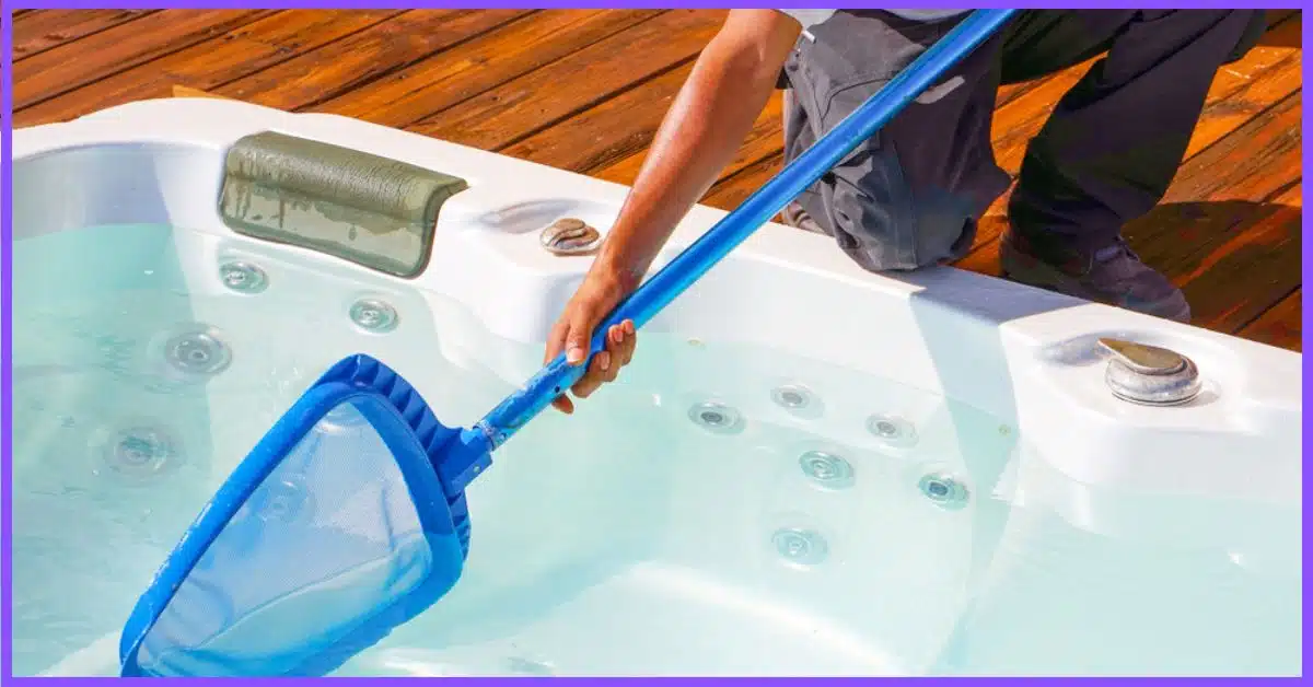 A man cleans and maintains her hot tub. (How to Get Rid of Hot Tub Bacteria) 