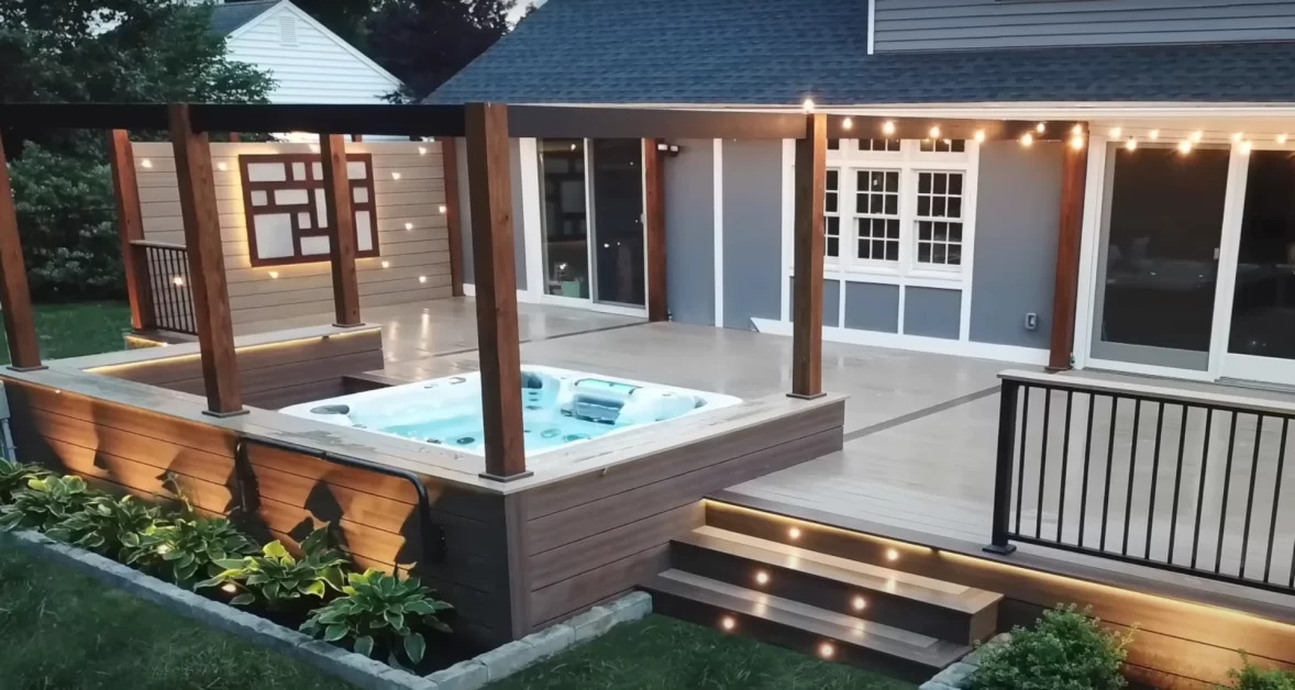 A hot tub under pergola privacy.