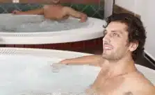 Two men doing Hot Tubbing in a spa