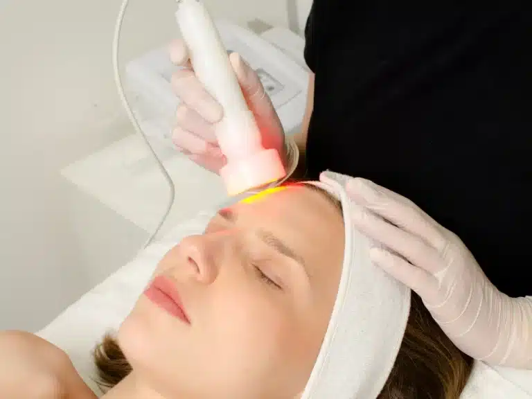 A woman receiving Red Light Therapy for Skin from a experts