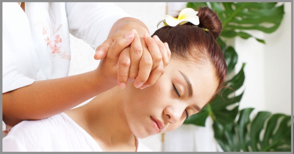 Young woman experiencing the spiritual side of Thai massage