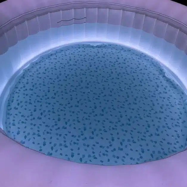 A inflatable hot tub losing water testing with mark