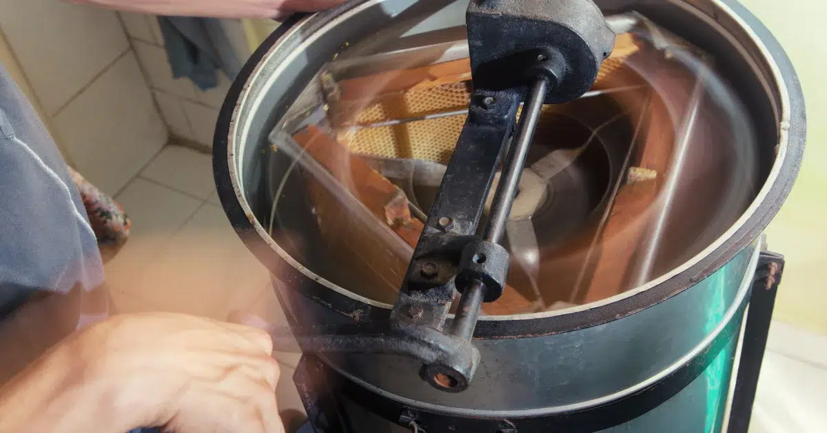 A honey extractor full of honey 