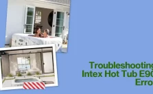 A couple relaxes in a white Intex hot tub set outside a house, surrounded by greenery, with the house entrance in the background. On the right, there’s a section with the title “Troubleshooting Intex Hot Tub E90 Error” displayed against a blue backdrop with an error message icon.