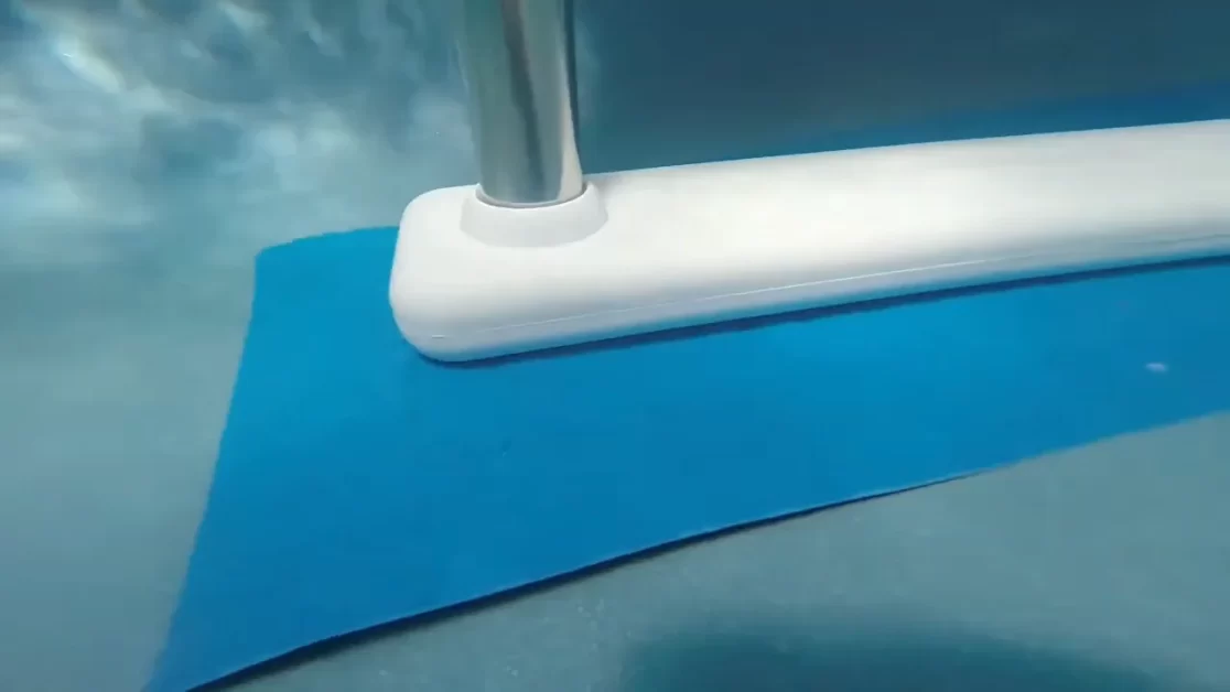 A blue pool ladder liner guard.